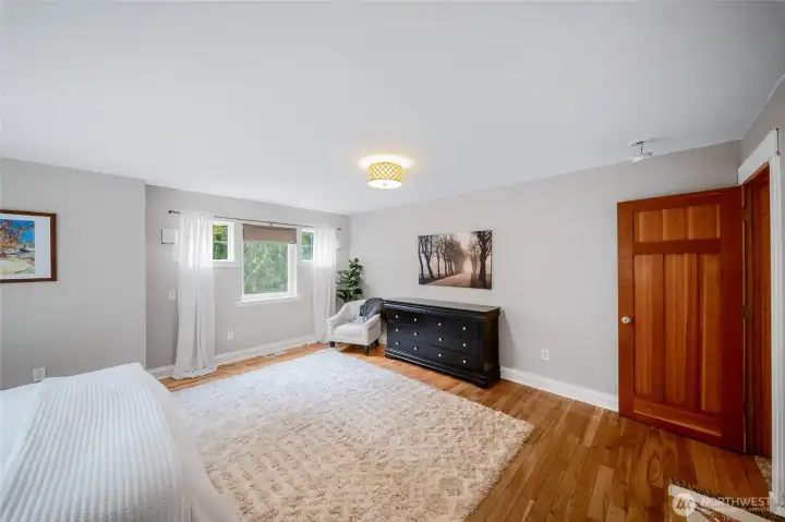 Another angle shows how spacious the primary suite is, with wall space for all of your large furnishings Another angle shows how spacious the primary suite is, with wall space for all of your large furnishings
