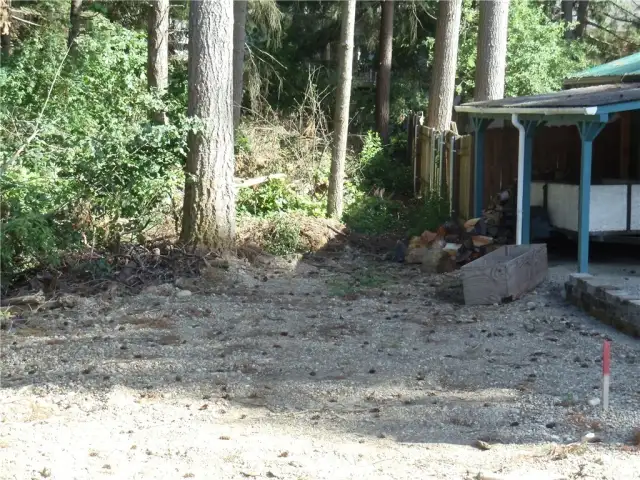 The NW property corner is in the area shown in the foreground on the south side of 14th Ave SE.