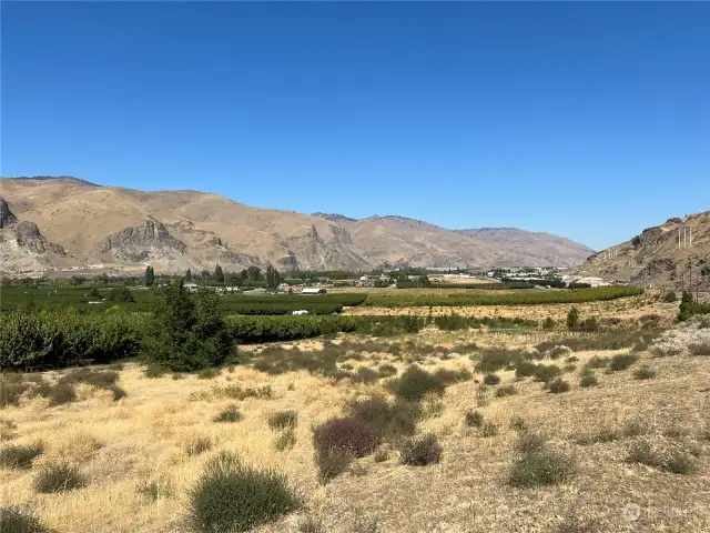 this view is near the SE corner of this large land sale looking up the Columbia river valley.  Commercial zoned properties in the distance to right