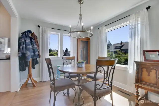 The Dining Room has Hardwood floors + 2 windows for natural light.
