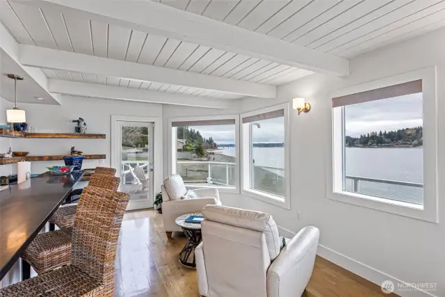 Enjoy the outdoors from the lovely deck off the main living space, where the amazing views will captivate while entertaining, barbecuing, or relaxing with your favorite beverage.
