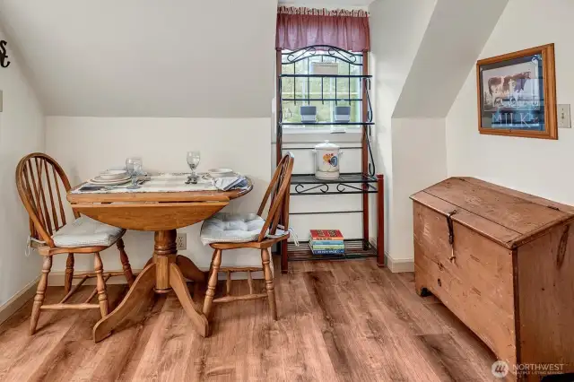 Cozy dining nook in the generous eat-in kitchen in the MIL apartment