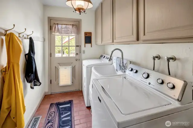 Laundry room with access to the backyard