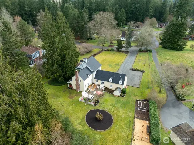 Charming New England colonial-style farmhouse on 1.15 acres located at The Homestead in Woodinville Wine Country