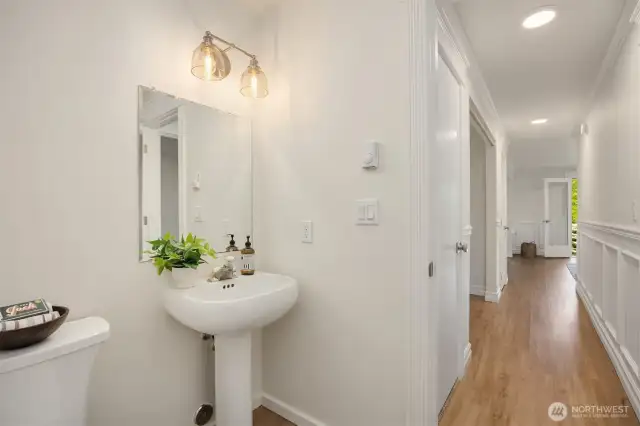Lower level bathroom just outside of the bonus room has a shower/tub combo
