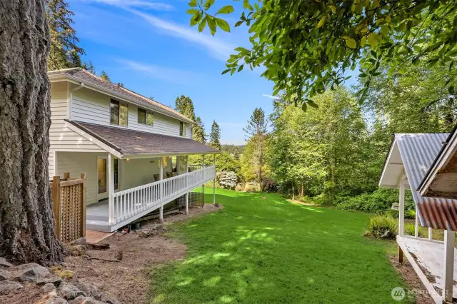 Two large storage areas to keep your wood stove stocked accompany the spacious yard