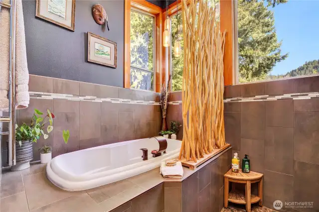 The primary bathroom with sunken shower to the right.