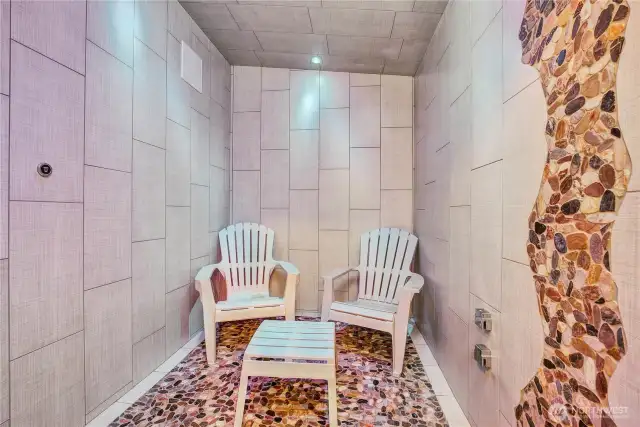 The steam room with shower and rain shower.