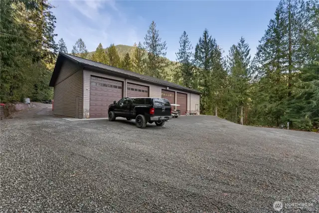 The huge 50x80 foot shop with 7 garage doors, 3 are drive through bays!