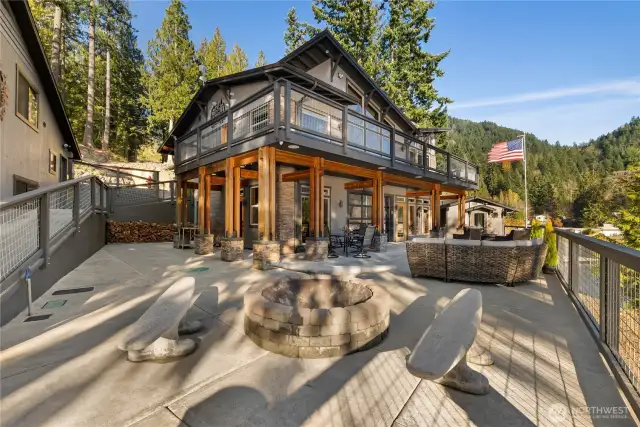 ADA ramp access to the large patio with cozy firepit.