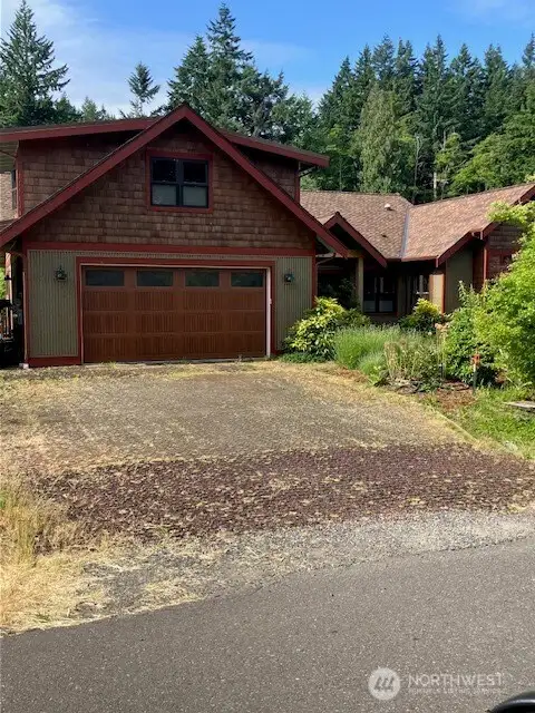 neighbor to west, very nice custom Craftsman