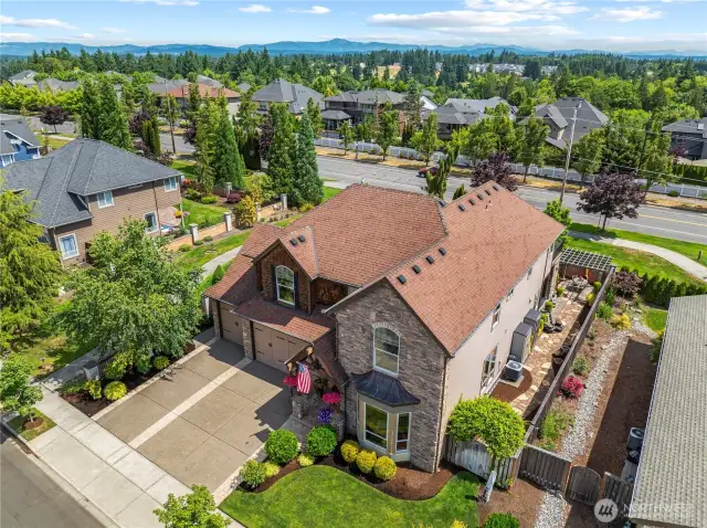 Every detail of this home is simply stunning...truly unique! Aggregate driveway, lovely landscaping, great curb appeal!