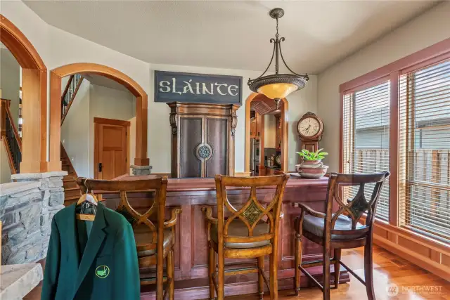 Formal dining (currently functioning as bar/cocktail space).  Arched detail and barrel ceiling which leads to butler & walk-in pantry....
