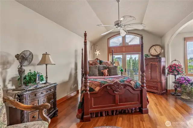 Welcome to the main suite! High, step-vault ceilings, french doors leading to balcony with a peek-a-boo view of Mt St Helens!
