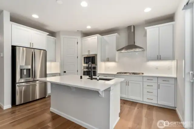 Photo of similar home in same neighborhood - finishes may vary