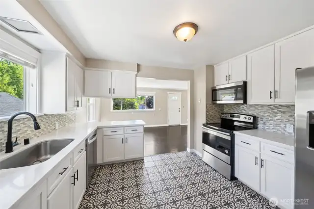 Kitchen updated in 2020. Quartz counters and stainless steel appliances.