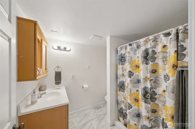 Downstairs full bathroom.