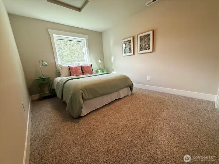 Bedroom #4. Versatile bedroom offering flexibility for guests, office space, or additional living needs. Comfortable layout with good natural light and ample room to suit a variety of uses.