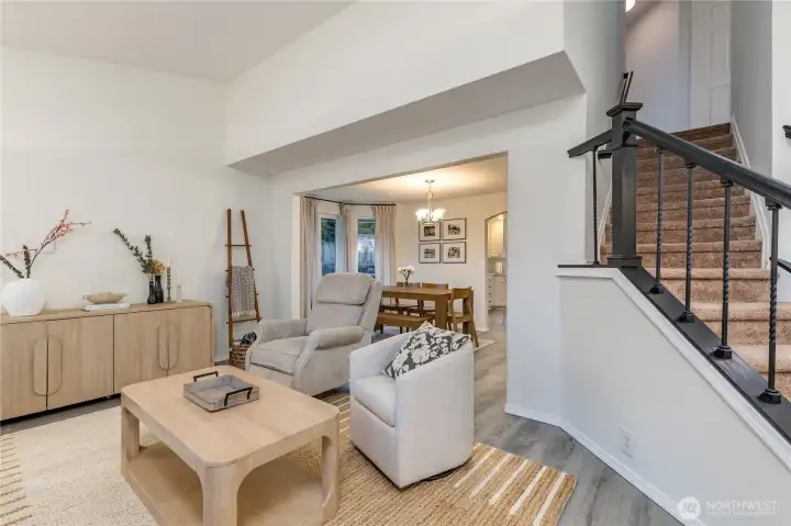 Living room flows to the formal dining room