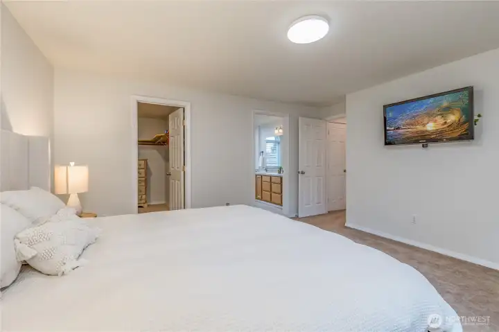 Walk-in closet and private bath in the primary suite