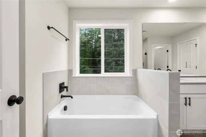 Photos of a previously completed home. Actual colors and finishes may vary. See site agent for details.