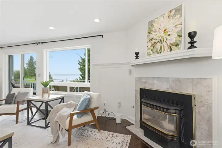 Gas Fireplace, dark hardwood floors & updated windows.