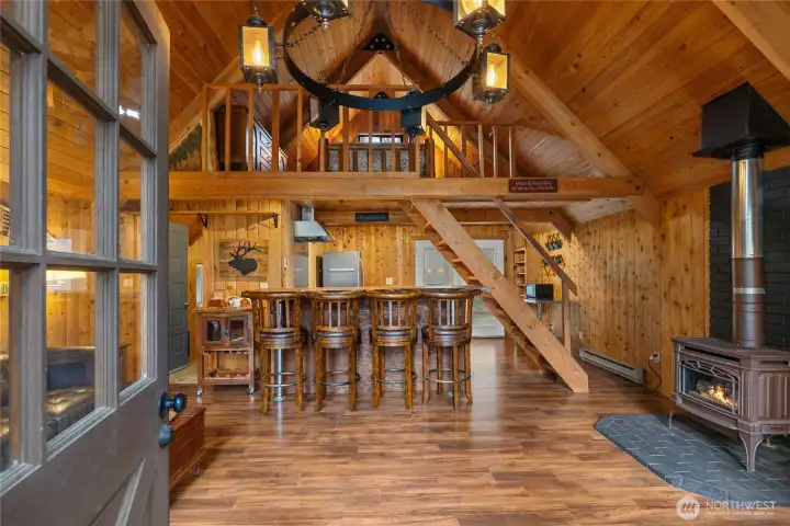 Soaring vaulted ceilings lined in warm wood.