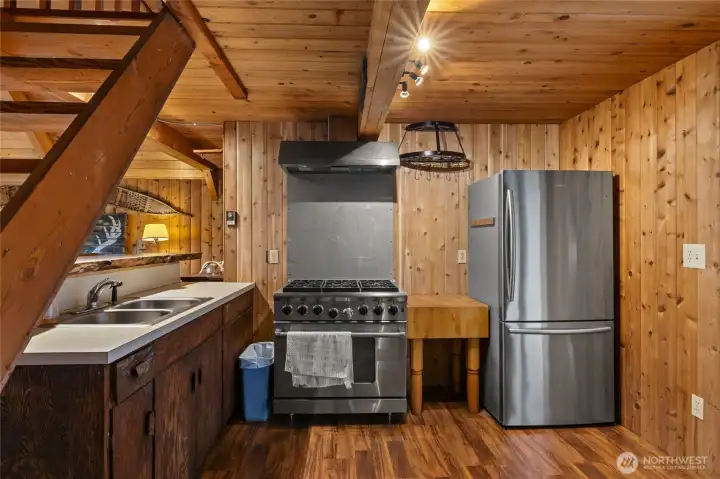 Stainless steel gas range ready for home-cooked meals.