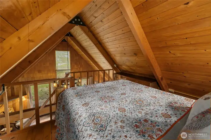 Comfortable sleeping quarters full of charm.