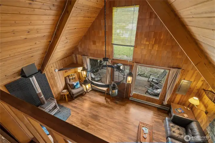 Elevated sleeping area overlooking the great room.