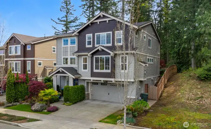 Fully-fenced backyard, large driveway and 4-car garage!