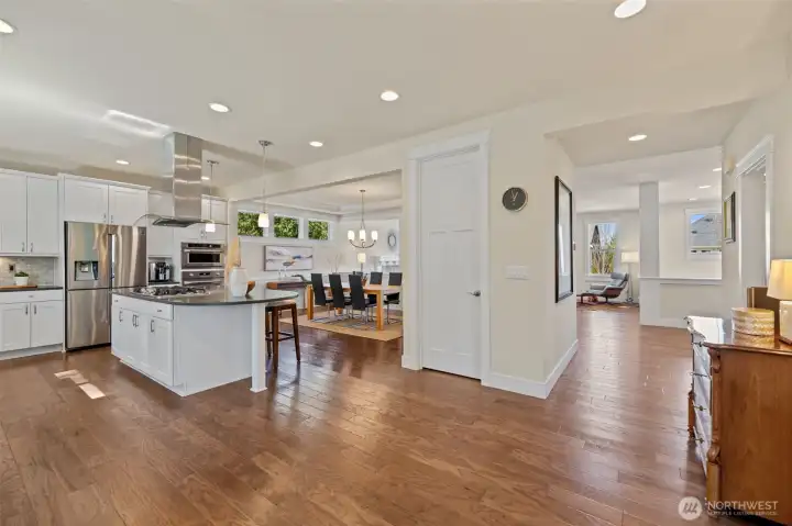 Walk-in pantry to keep your groceries organized! and handy! The powder room is tucked away on the right (the door behind the dresser).