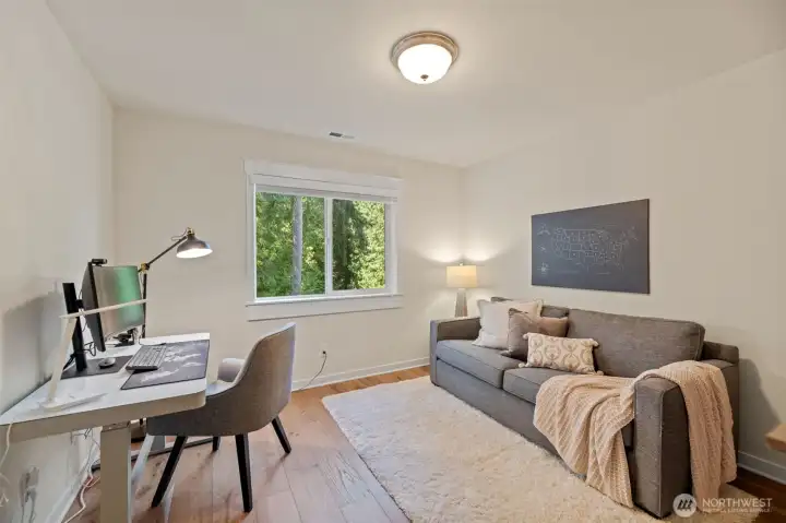 Third secondary bedroom upstairs, currently used as an office. The couch is a sofa couch, to accommodate friends and family.