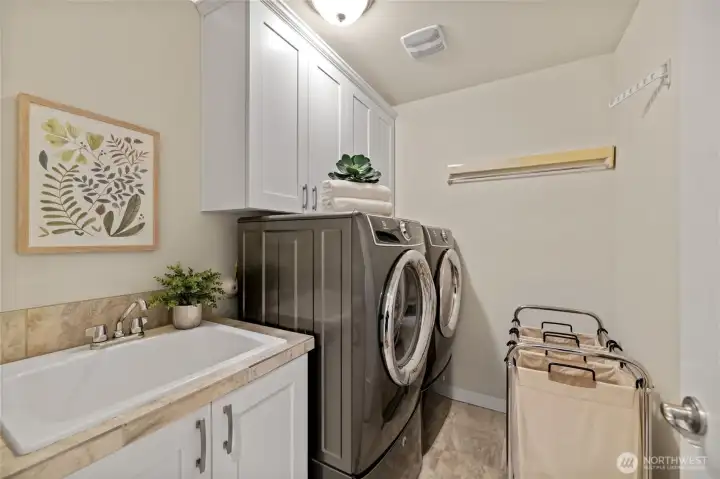 Dedicated laundry room, located on the upper floor for more convenience.