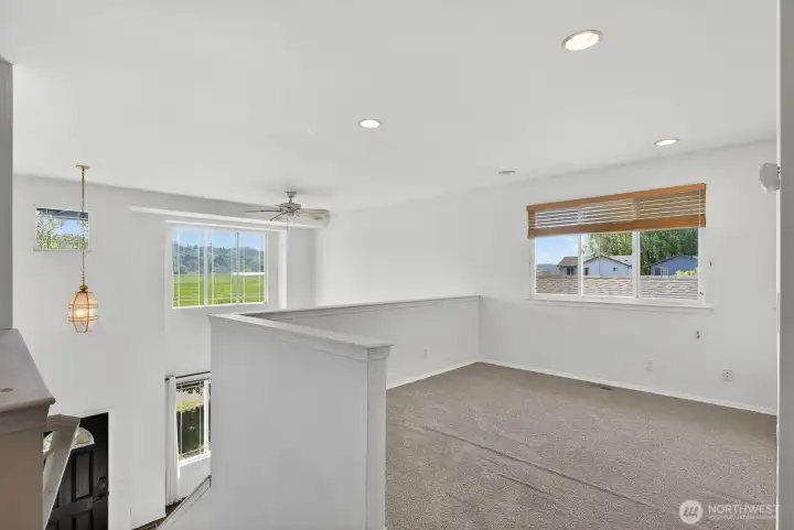 Bonus room/flex space at top of stair landing