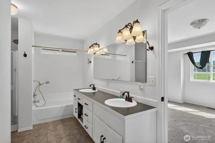 Primary bathroom w/dbl sinks, tub and sep. shower