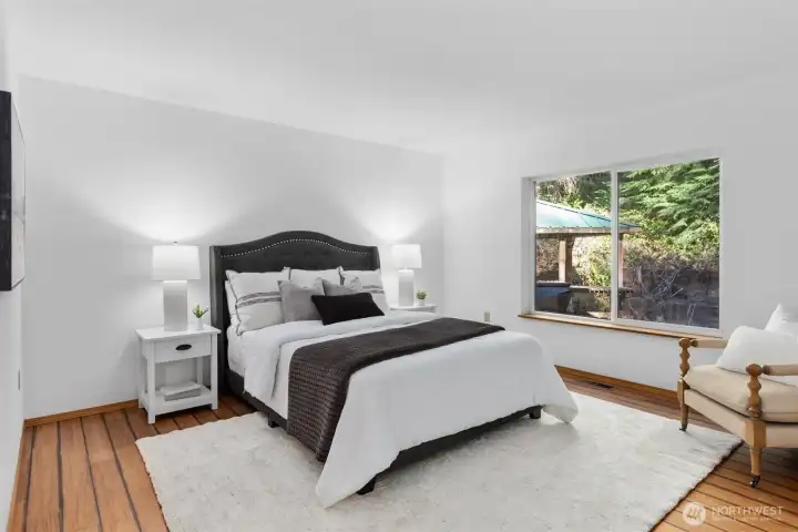 Primary Bedroom (on GROUND FLOOR!) with LARGE window to Private Backyard