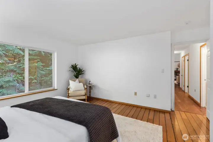 Primary Bedroom with view of First Floor Hallway