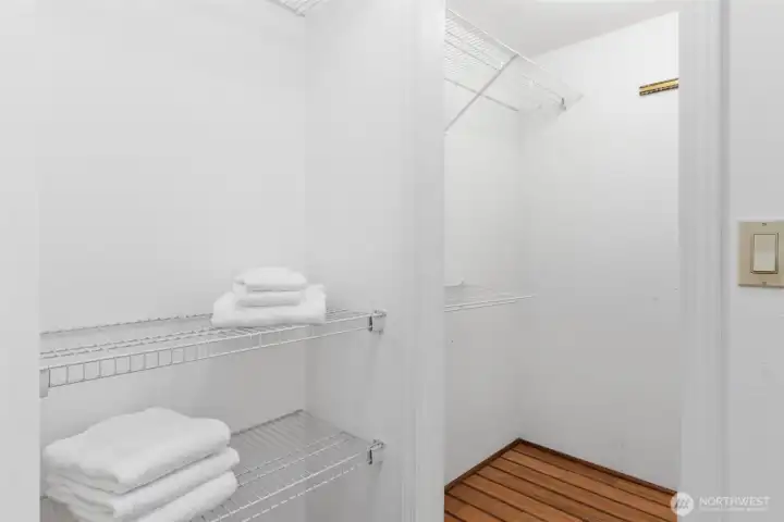 Closet in Primary Bathroom with Additional Shelving for more Storage!