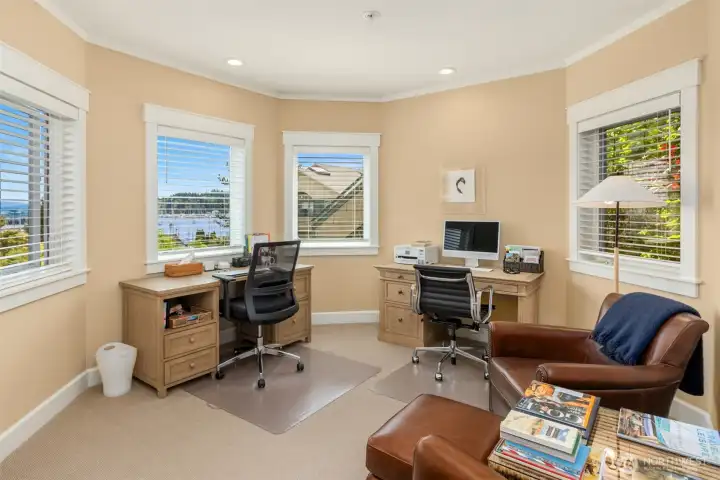 An alcove in the primary perfect for reading nook or home office.