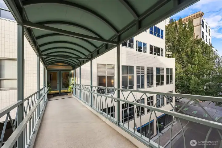 Skybridge to private secure garage with deeded parking space