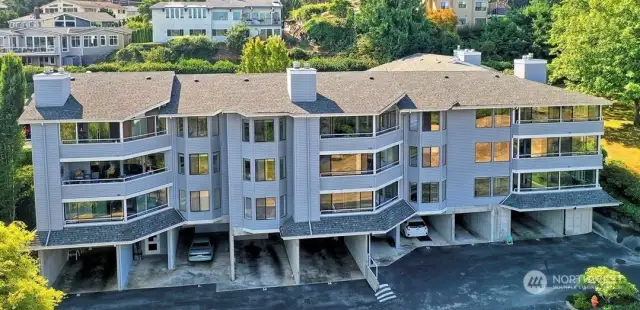 Second Floor unit faces Northwest for sunsets and uses carport M and space 63 for parking