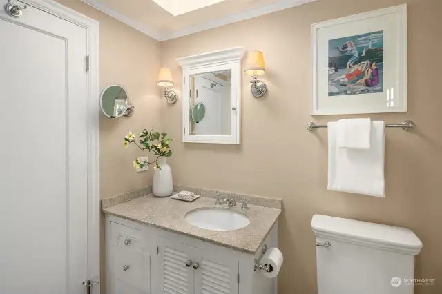 Upper level bathroom with skylight for additional natural light!