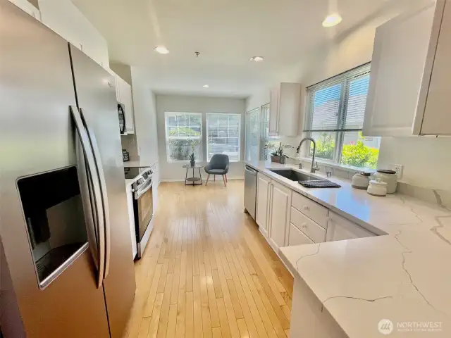 Beautiful new quartz counters & stainless steel appliances make this kitchen a dream