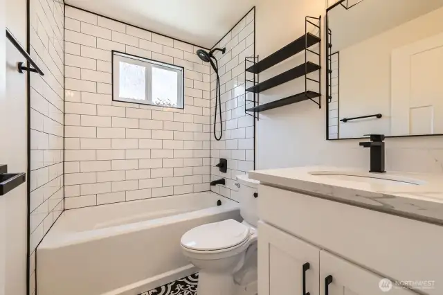 Primary bathroom with shower and tub.