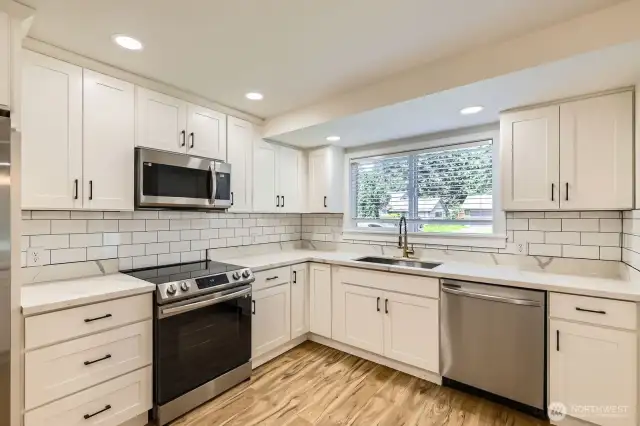 New quartz counter tops- self-closing cabinets