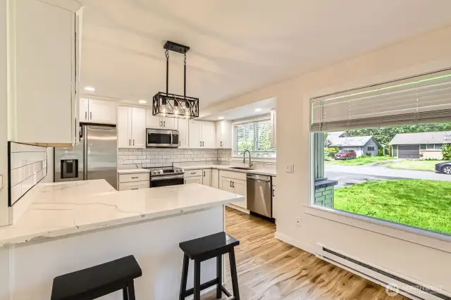 A view from the living room to the kitchen-cozy!