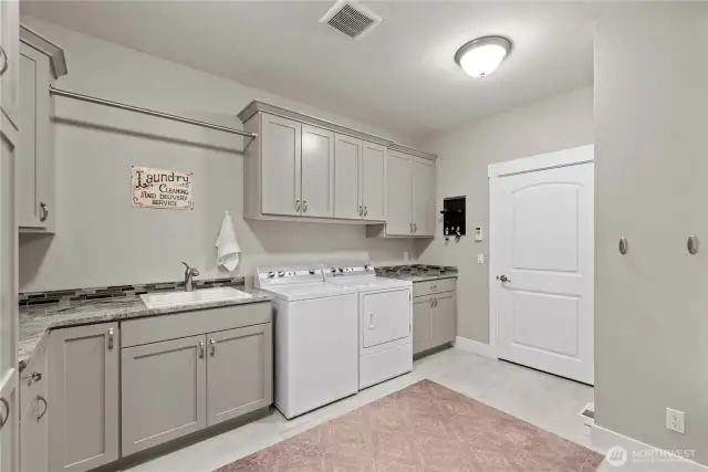 Laundry room with built-in storage