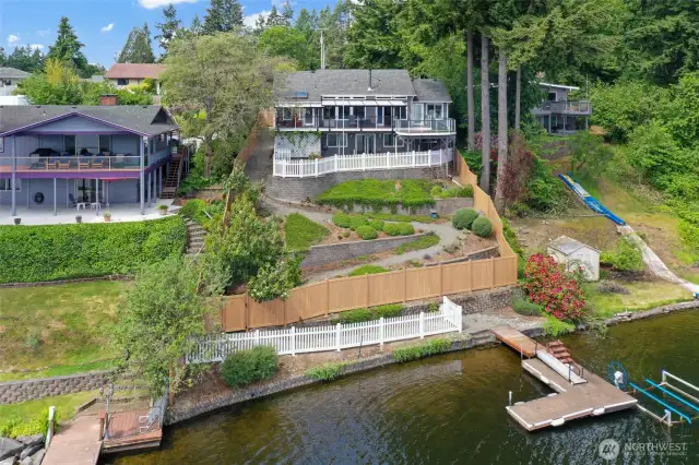 Panoramic views and easy walk to your dock. Water side is fully fenced.