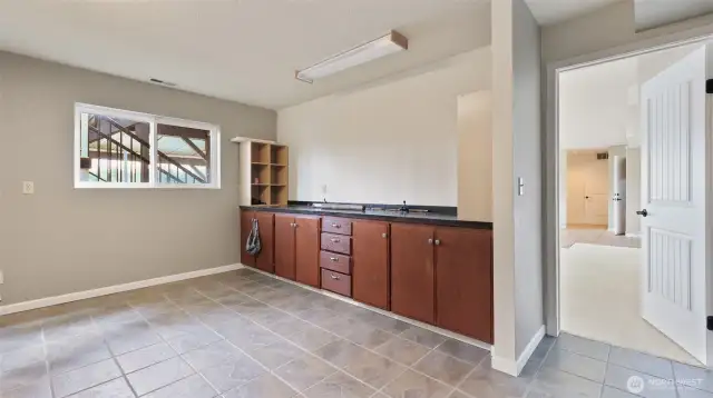 Lower floor den or office with built-ins and even a lake view